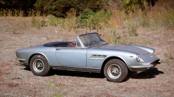 This fully restored 1957 Ferrari 250 Testa Rossa with V-12 engine set a record for the highest price ever paid for a car at auction.