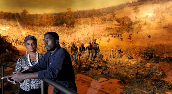 Image: Camille Love and Yakingma Robinson at the Cyclorama at the Civil War museum in Atlanta