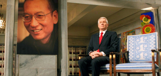Image: Norwegian Nobel committee chairman Jagland sits next to an empty chair during the Nobel Peace Prize ceremony at Oslo City Hall