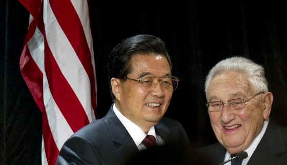 Image: Chinese President Hu Jintao stands along