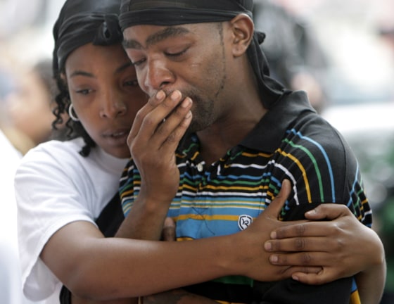Image: Teddy Canada and Chaliah Griffin mourn the loss of their daughter