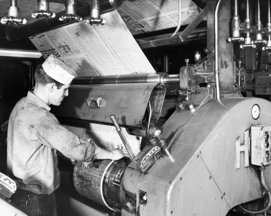 Image: A worker operates a press at the New Orleans Times-Picayune
