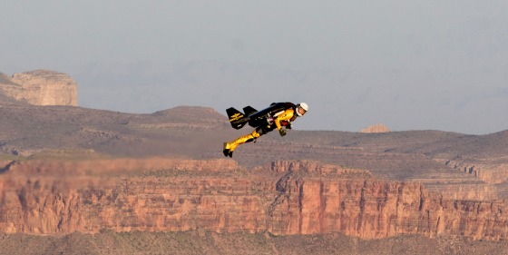 Yves Rossy's sponsor, Breitling, released this image Tuesday, saying it shows him shortly after jumping out of a helicopter and flying 200 feet above the rim of the Grand Canyon West on Saturday.