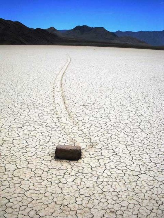Image: Rock with trail behind it