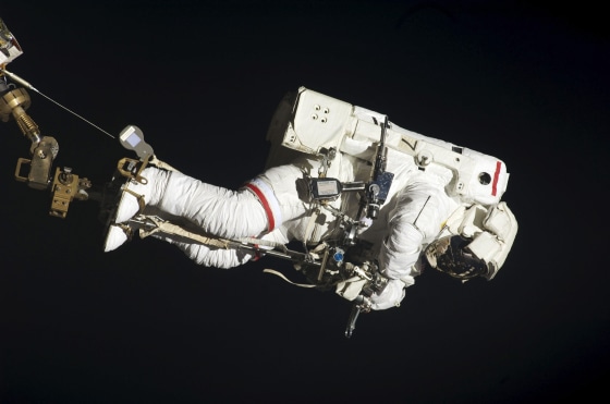 Image: Astronaut Dave Wolf performs his second spacewalk and the second of five for the Endeavour crew scheduled in a little over a week's time
