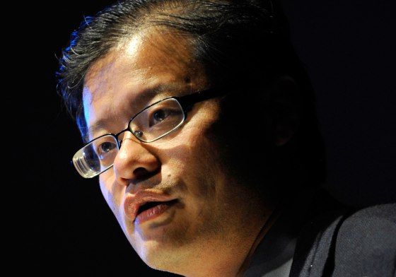 Yang, CEO and co-founder of Yahoo!, gestures as he addresses a conference in central London
