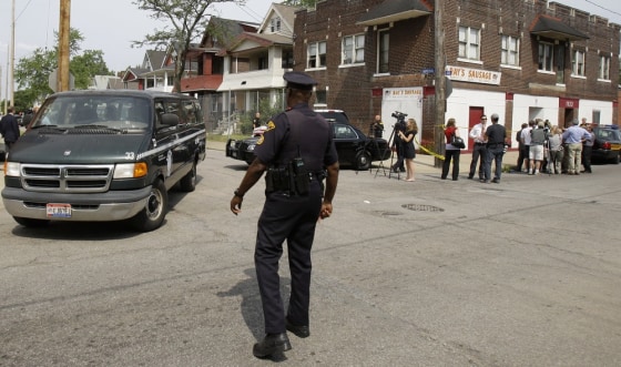 Image: A van with jurors leave the scene after visiting Anthony Sowell's home in Cleveland