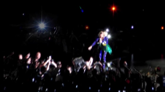 Beyonce pulled off stage by fan during Brazil concert