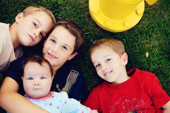 From left, twins Aaron and Blake Smith, 6; Juliet, three months; and Evan, 4, smile in a photo taken in their Corona, Calif., neighborhood. Their mother, Bridget Smith, was one of many msnbc.com readers who said the economy was affecting their Thanksgiving this year.