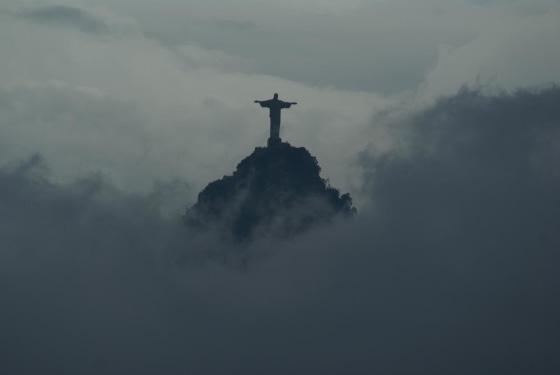 Christ the Redeemer, on the Corcovado Mountain, from the top of Sugarloaf Mountain in Rio de Janeiro. March 2009.