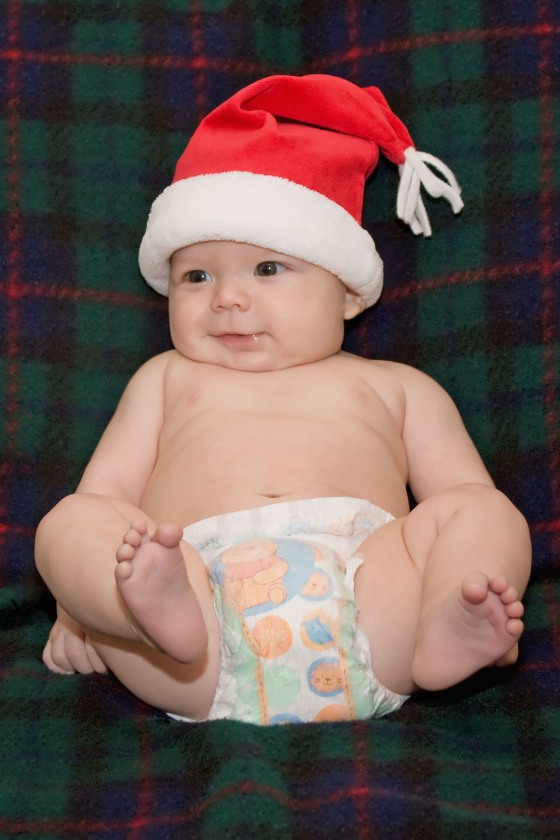 From reader Rick Welch of Des Moines, Iowa, who writes: "My wife and I were blessed with two more grandsons in 2008, which puts the total at 16 grandchildren. Their ages are 17 years down to 5 months. Baby Mason is number 16 and he is ready for Santa." What a cutie!