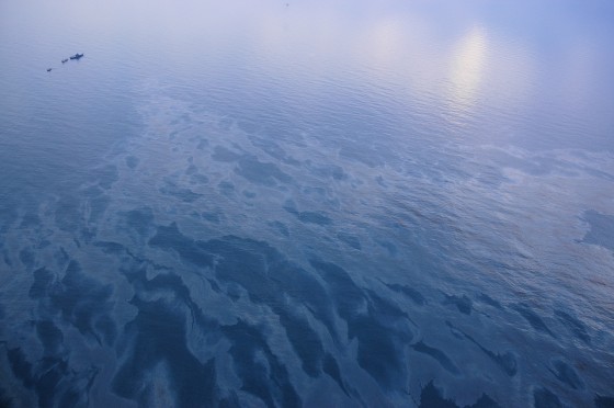 Part of an oil spill off Ireland in the North Atlantic is seen Tuesday. A Russian aircraft carrier and an escorting tanker and tug are at top left.