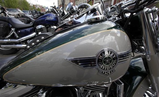 Earns Harley Davidson