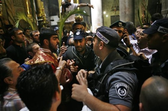 APTOPIX MIDEAST ISRAEL PALESTINIANS CLERGY FIGHT