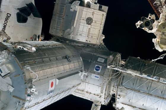 Astronauts work with untested equipment