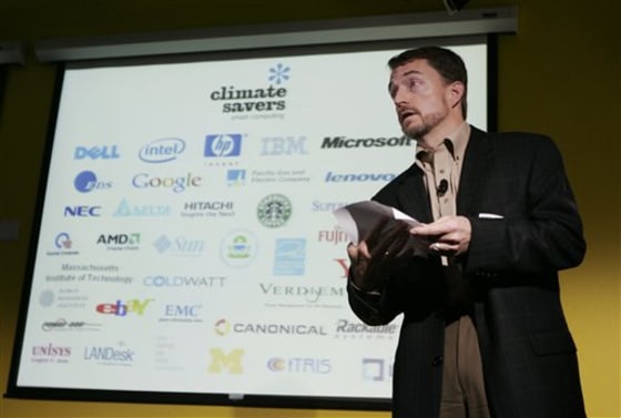 With partner logos behind him, Intel Corp. Senior Vice President and General Manager Pat Gelsinger on Tuesday spells out how industry plans to reduce the carbon emissions of computers.