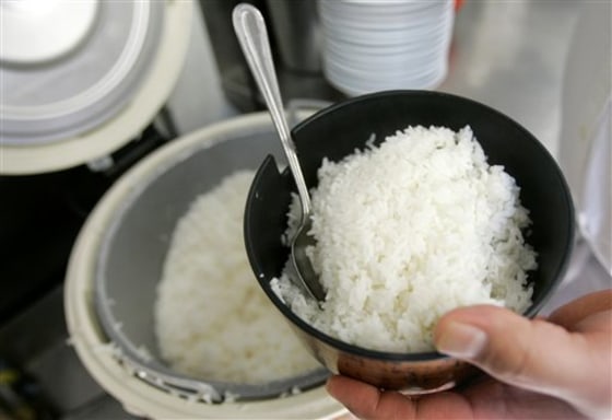 Immigrants worried about cost stock up on rice
