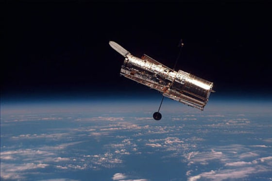 This picture of the Hubble Space Telescope was snapped from the shuttle Discovery during a 1997 servicing mission.