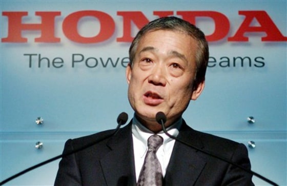 Takeo Fukui, chief executive of Honda Motor Co., is seen announcing the automaker's new mid-term business strategy in Tokyo Thursday.