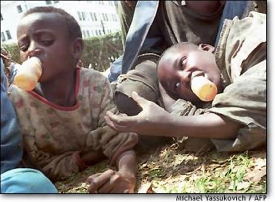 Street children sniff glue in Nairobi.
