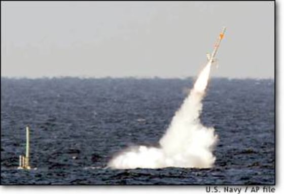 A Tomahawk cruise missile is seen emerging from the ocean after being launched from the attack submarine USS Florida during a test in January.