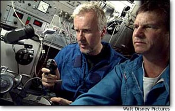 James Cameron, producer and director of "Ghosts of the Abyss," shares a submersible with narrator Bill Paxton, at right, during a filming expedition to the wreckage of the Titanic in 2001.