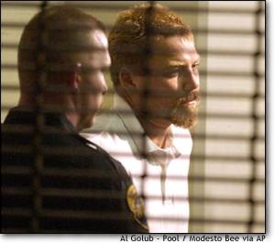 Scott Peterson was escorted into the county jail in Modesto, Calif., in April.