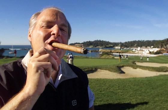 In this 2001 file photo, Talk show host Rush Limbaugh puffs on his Ashton VSG cigar while waiting to tee off at the Pebble Beach Golf Links during the AT&amp;T Pebble Beach National Pro-Am in Pebble Beach, Calif. (Photo by Eric Risberg/AP)