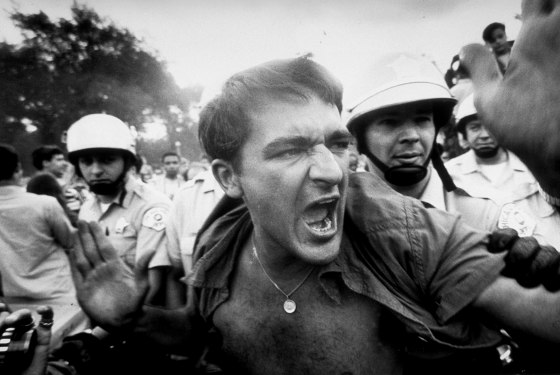 A protestor is led away by police from a demonstration outside the 1968 Democratic National Convention in Chicago.