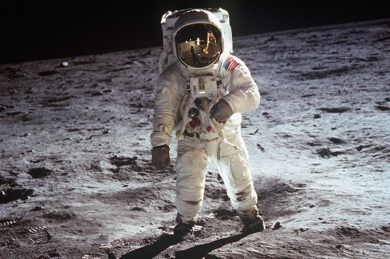 American astronaut Edwin \"Buzz\" Aldrin walking on the moon on July 20, 1969 during Apollo 11 mission. Neil Armstrong's reflection in the visor of the helmet. (Photo by Apic/Getty Images)