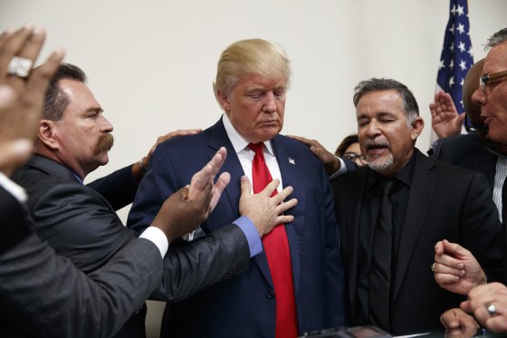 Pastors from the Las Vegas area pray with Republican presidential candidate Donald Trump during a visit to the International Church of Las Vegas, and International Christian Academy on Oct. 5, 2016, in Las Vegas, Nev. (Photo by Evan Vucci/AP)