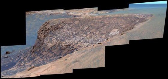 This color-coded view shows Cape Verde, a craggy feature on the rim of Mars' Victoria Crater, as seen from another promontory called Cape St. Mary. The colors have been processed to emphasize color variations in the rock and soil.