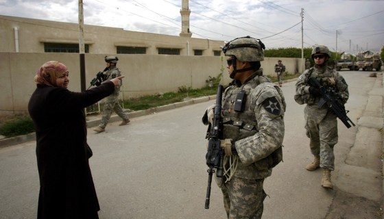 An Iraqi woman asks for permission to wa