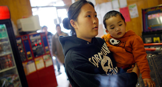 Image: Siamphay Khamphavong and son in Iowa.