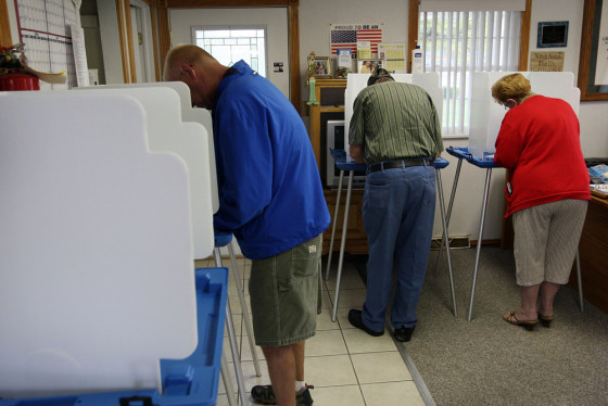 Image: Voters mark their ballots