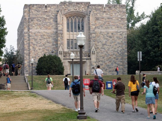 Image: Virginia Tech students walk to classes in front of Norris Hall at the school in Blacksburg, Va.