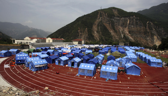 Image: Temporary relief tents located inside a sports stadium in earthquake-hit Beichuan