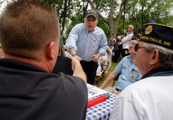 Image: Republican presidential candidate U.S. Senator McCain greets veterans in the audience at a campaign picnic outside the Maine Military Museum in South Portland