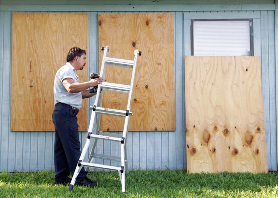 Michael Gorsline boards up his home in Corpus Christi, Texas, on Monday. He said he wanted to be prepared in case Tropical Storm Dolly strengthened and made landfall in the Coastal Bend area. 