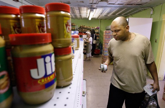 Image: College student at a food bank