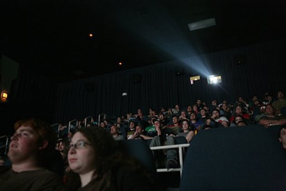 Fans watching the first showing of "Indiana Jones and the Kingdom of the Crystal Skull" in Tyler, Texas. Hollywood studios and neuroscientists are increasingly using technologies such as brain scans to peer inside the minds of moviegoers.