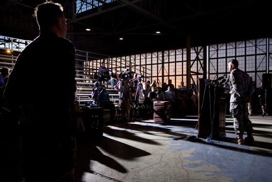 Image: n this June 5, 2008 file photo, a defense counsel takes a question from members of the media during a news conference inside a hangar used for media activities