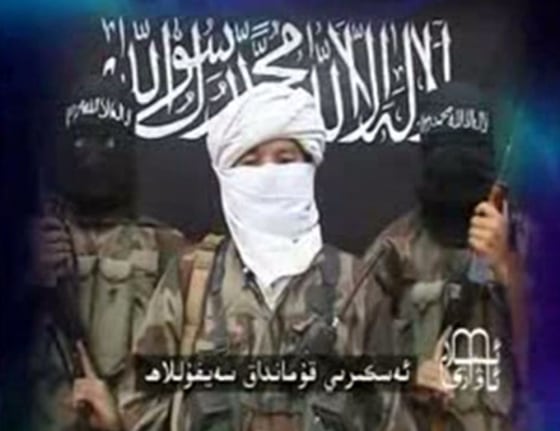 This image taken from video and obtained from the IntelCenter is part of a July 23 video released by the Turkestan Islamic Party (TIP) entitled "Our Blessed Jihad in Yunnan." According to the IntelCenter, the video features a statement by TIP Commander Seyfullah threatening the Olympic Games in China.