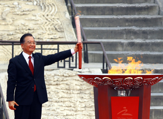 Image: Chinese Premier Wen Jiabao holds the Paralympic torch