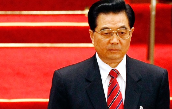 Chinese President Hu Jintao stands before singing national anthem in Beijing