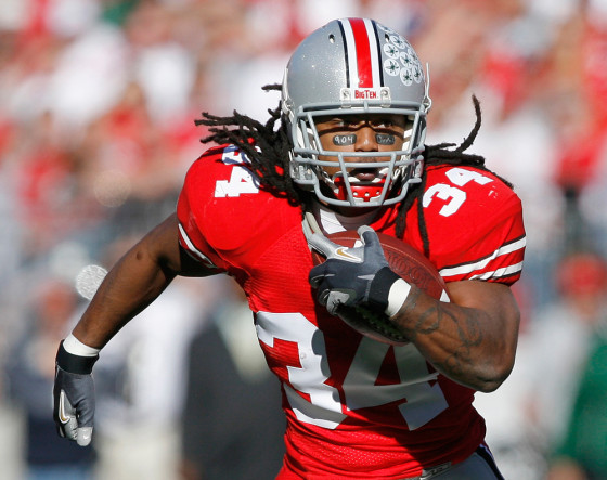 Ohio State University tailback Wells runs with the ball against Michigan State University during the first quarter of their NCAA football game in Columbus
