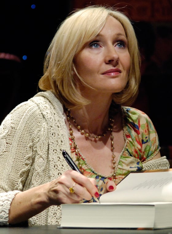 Author Rowling signs copies of her seventh and final Harry Potter book, \"Harry Potter and the Deathly Hallows\", during an open book tour stop at the Kodak Theater in Los Angeles