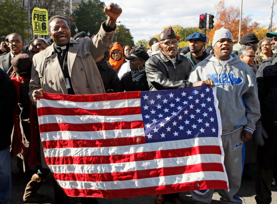 Demonstrators March On Justice Department To Protest Hate Crimes