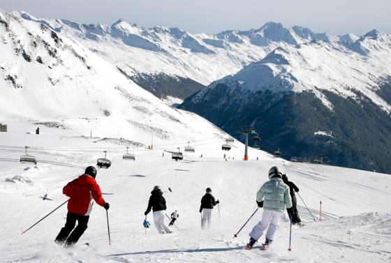 Skiers enjoy the perfect conditions with a lot of fresh fallen snow and blue skies on Nov. 18 on the Weissfluhjoch mountain above Davos in southeastern Switzerland. Due to the early and rich snowfalls many ski resorts in the Swiss mountains already opened for the new season this weekend.