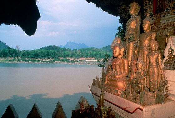 Image: Statues of Buddhist Deities in the Sacred Caves of Pak Ou, Laos